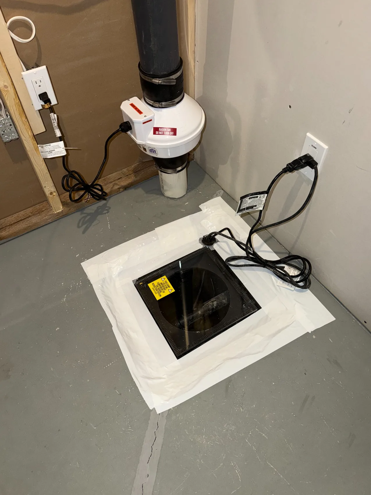 Radon Pros project photo: fan connected near sealed sump access