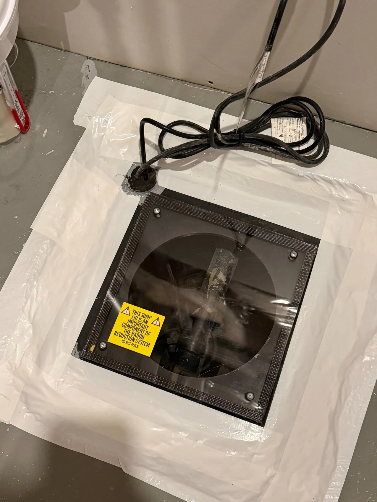 Radon Pros project photo: a close look at the sealed inspection cover