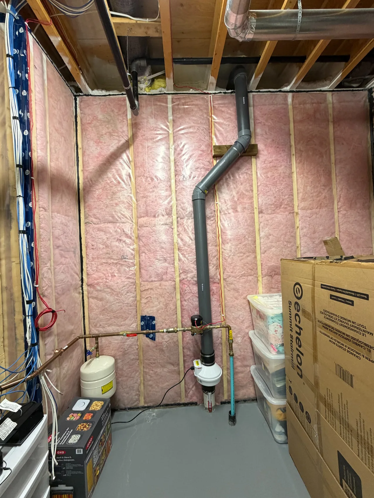 Radon Pros project photo: real basement pipe layout and support